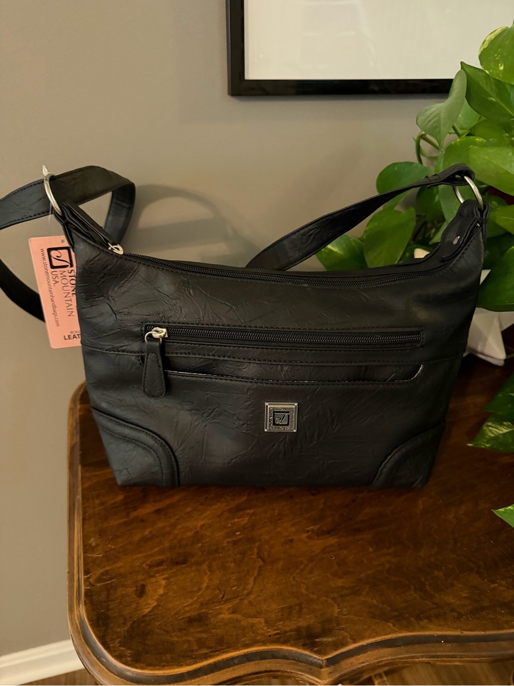 NWT. Stone Mountain Black Leather Shoulder Bag with Front Zips.